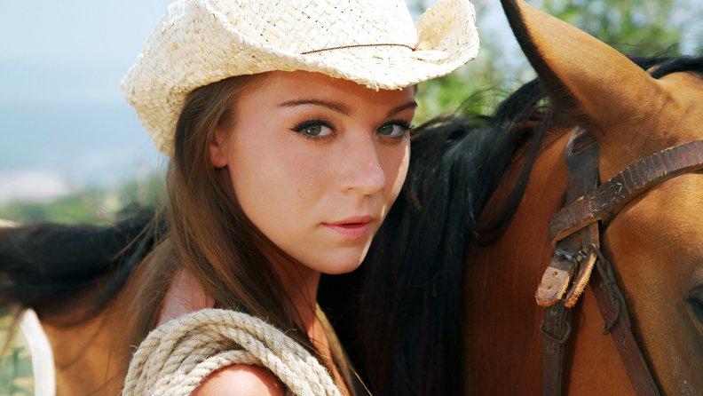 Cowgirl And Her Horse