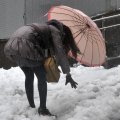 Woman in Snow in Tokyo Japan