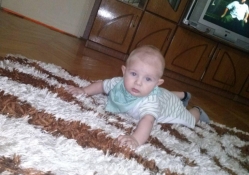 BABY LEARNING TO CRAWL