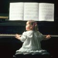 Cute baby with piano