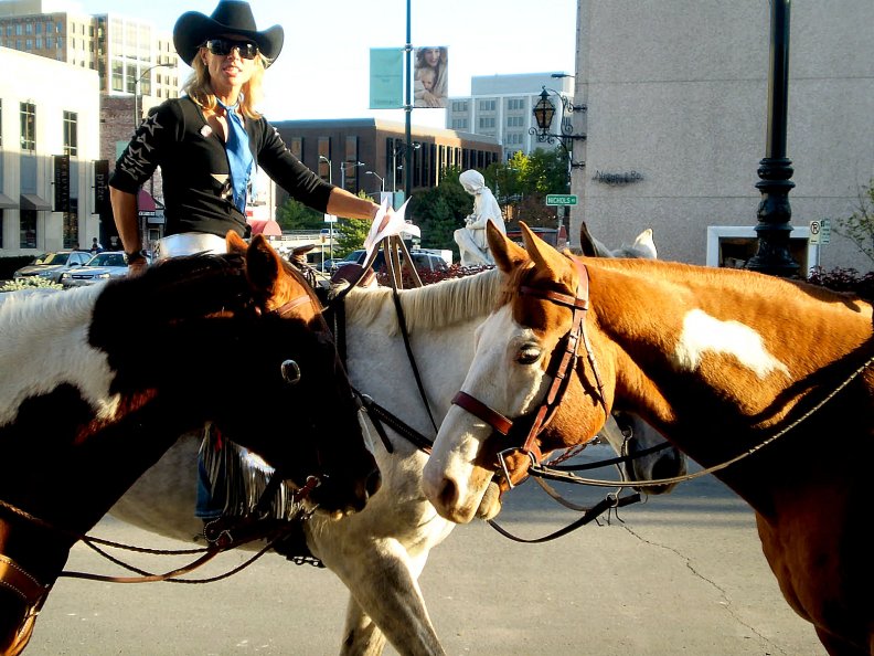 cowgirl_riding_the_street.jpg