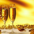 new year, two glasses with champagne gold