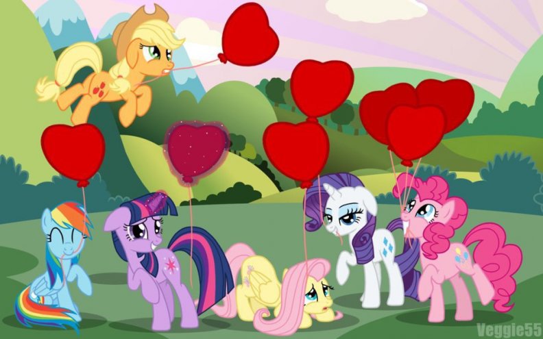 ponies_holding_heart_shaped_baloons.jpg