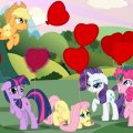 ponies holding heart shaped baloons